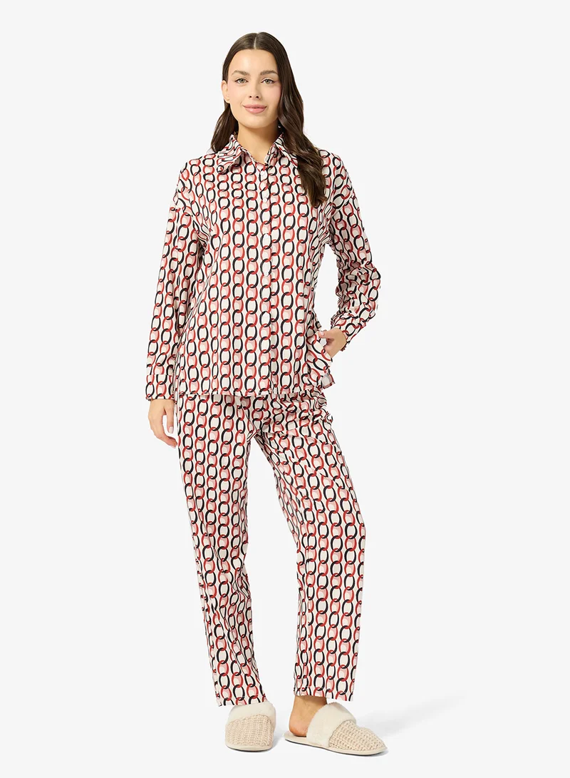 جينجر طقم بيجامة وقميص بأزرار بلون واحد